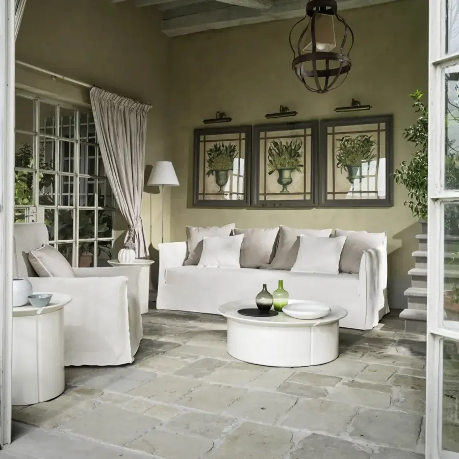 Elegant Gervasoni Ghost lounge chair with frame, backrest cushions in Dacron and down, matte off‑white fabric, beige cushion