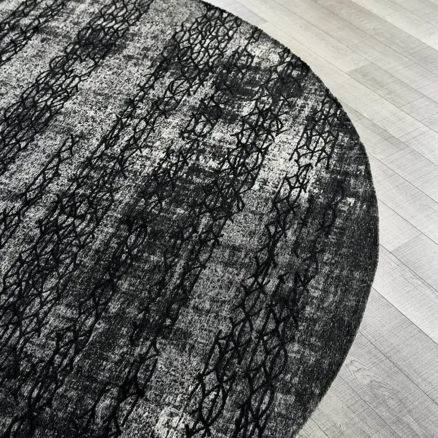 Exceptional Cattelan Italia Mumbai rug crafted in cotton and chenille with relief texture and a subtly distressed black grey palette