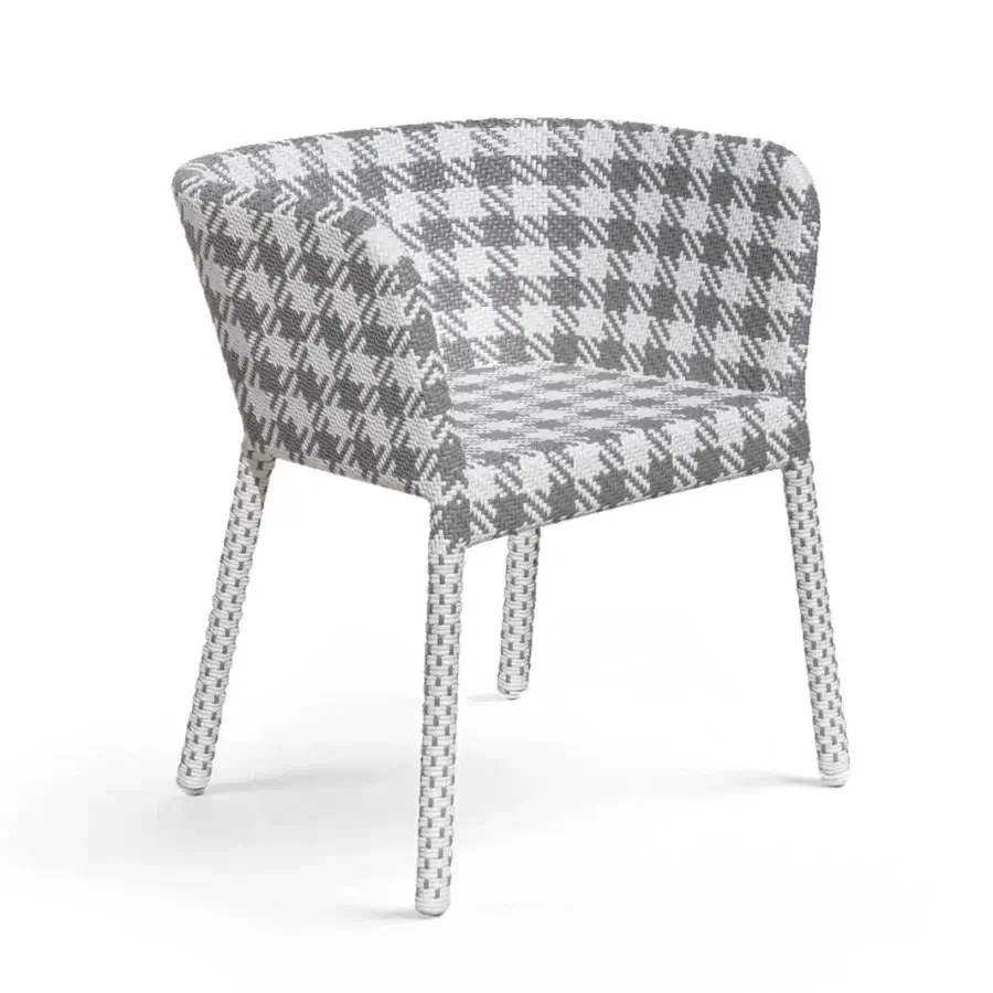 Elegant armchair with low to medium tub style silhouette curved back, grey and white tartan woven fiber plus sleek tapered legs