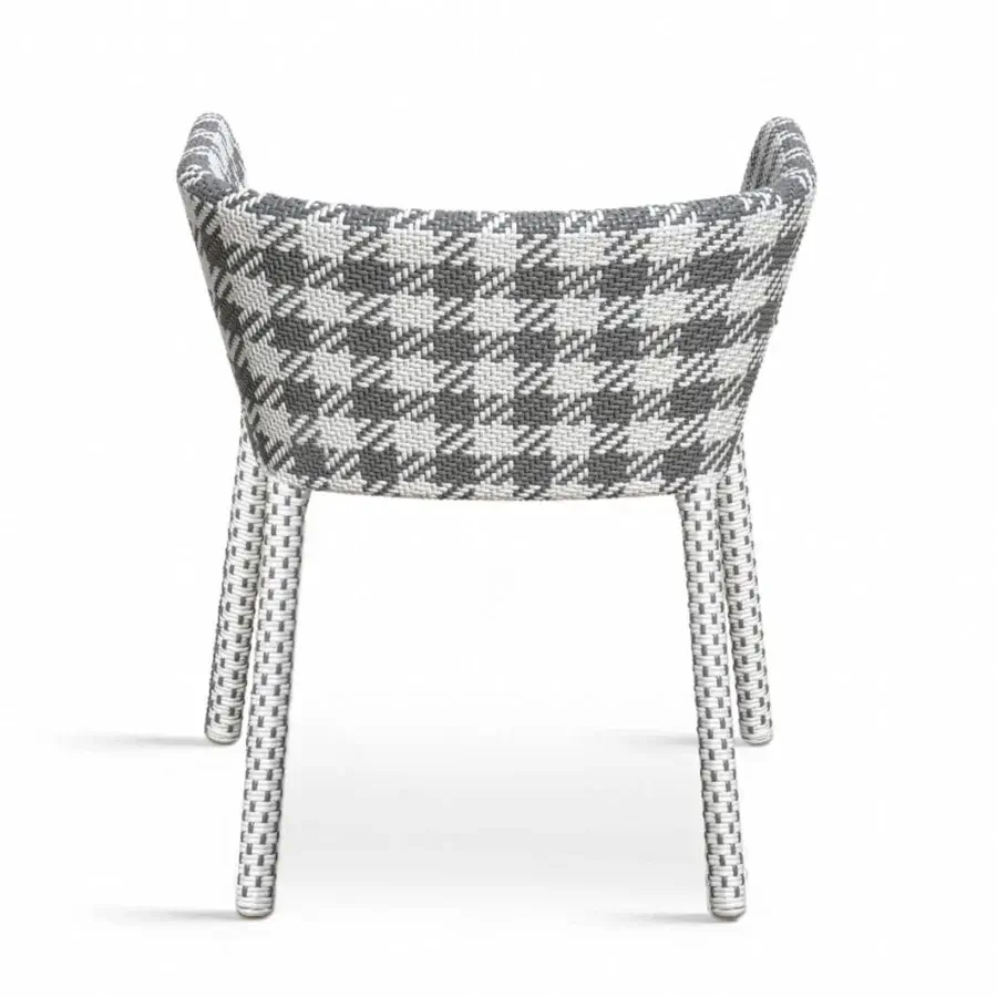 Contemporary armchair with Italian woven fiber, grey‑white tartan pattern, and braided finish on cylindrical legs