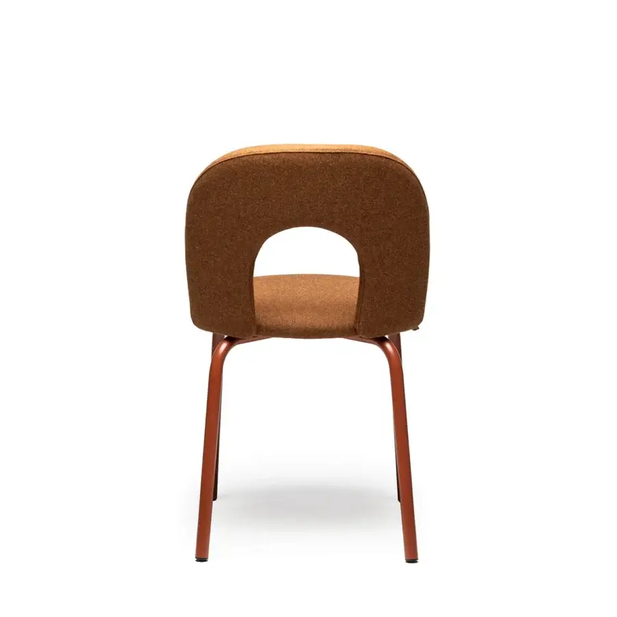Architectural Chairs & More Paulin seat with cutout backrest in burnt orange textile on terracotta powder-coated base