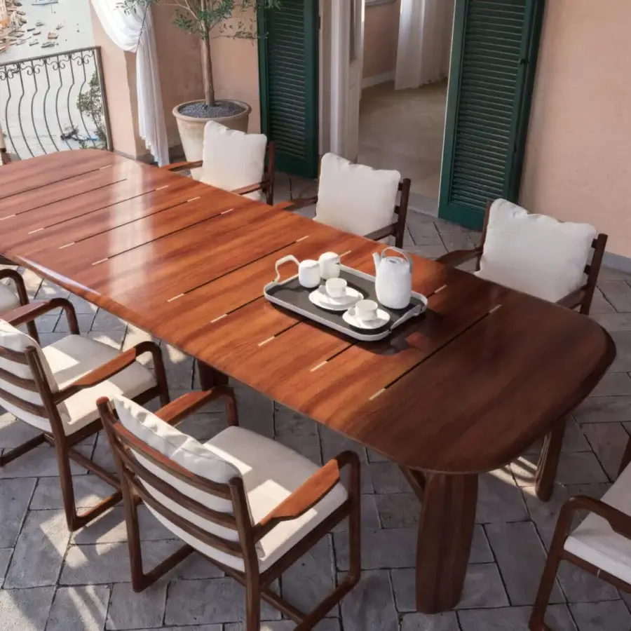 Elegant CPRN Homood Matheus table with medium-to-dark brown wood and satin-like finish, sinuous stretcher, tapered legs