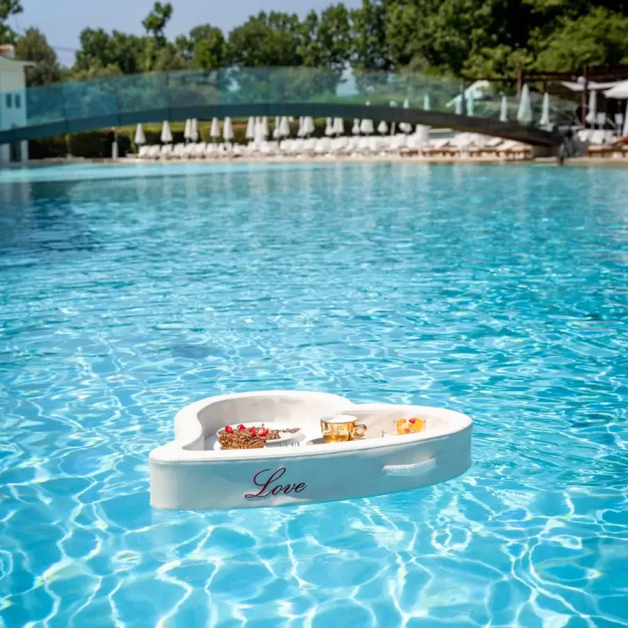 Sophisticated Trona Floating Poolside Love Tray heart-shaped accessory in white nautical eco-leather with red cursive script
