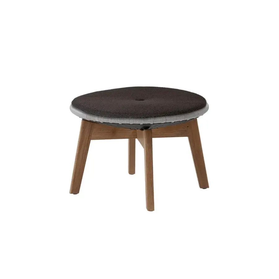 Refined Cane-Line Peacock side table stool with circular dark brown charcoal weave, light grey trim and matte wooden legs
