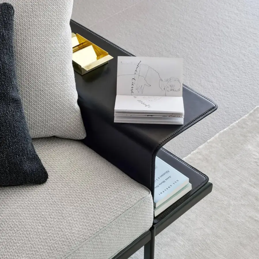 Distinguished Bonaldo Phil sectional upholstered in light gray textile with black leather armrests and matte varnished metal base