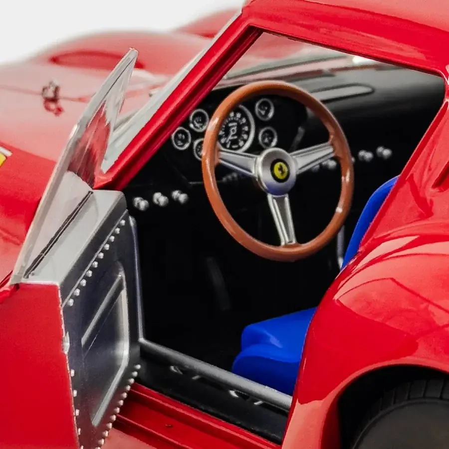 Distinguished Vèlle Milano Ferrari 250GTO piece in high-gloss red with blue synthetic seating and silver-toned metal panels