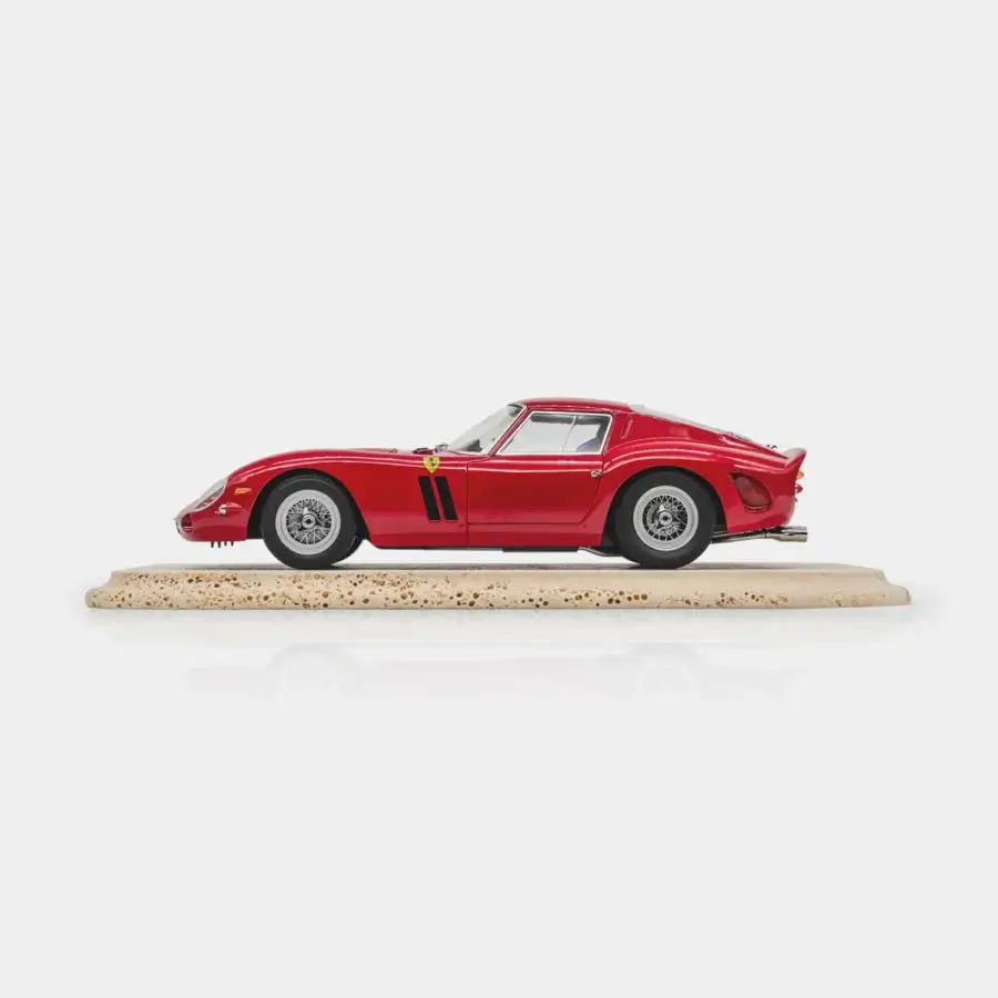 Sophisticated Vèlle Milano Ferrari 250GTO decorative model in glossy red with silver metal wheels and matte cream porous base