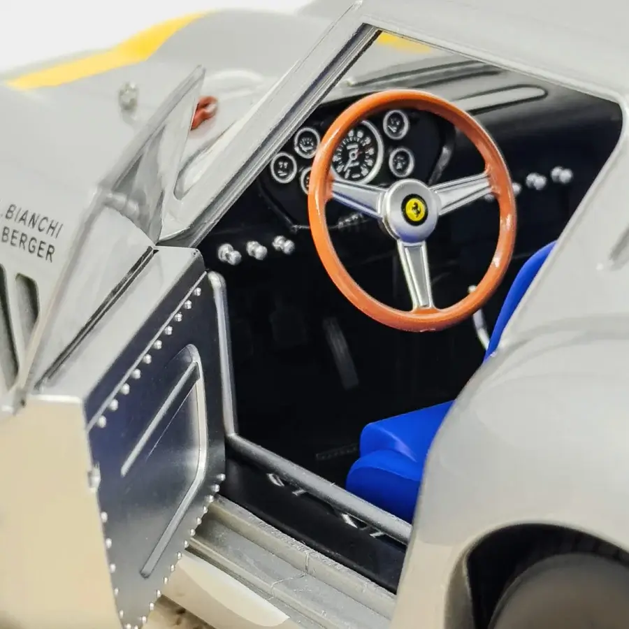 Elite Vèlle Milano Ferrari 250GTO Tour de France metal model in glossy silver with blue upholstered interior on marble base