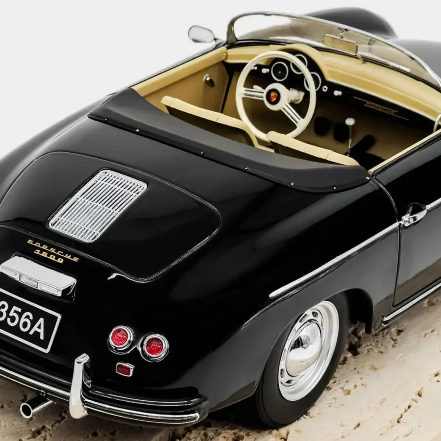 Exquisite Vèlle Milano Porsche 356 A Speedster decorative model in high-gloss black metal with beige interior and marble base