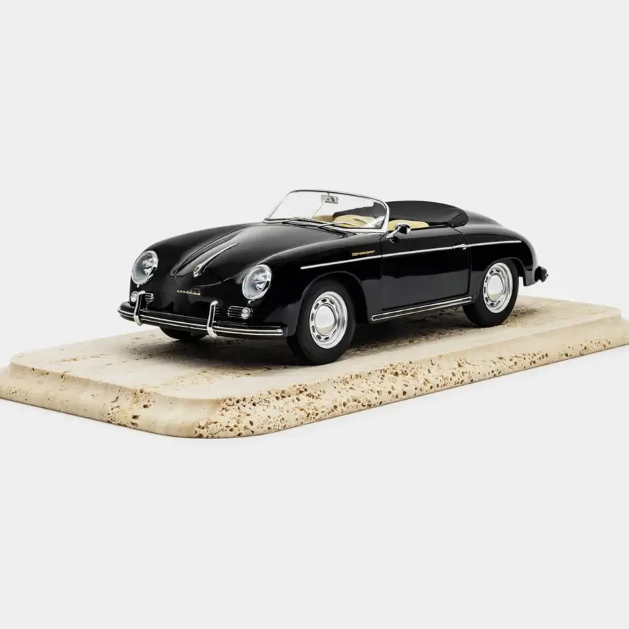 Sophisticated Vèlle Milano Porsche 356 A Speedster piece in glossy black metal with beige interiors and natural marble base