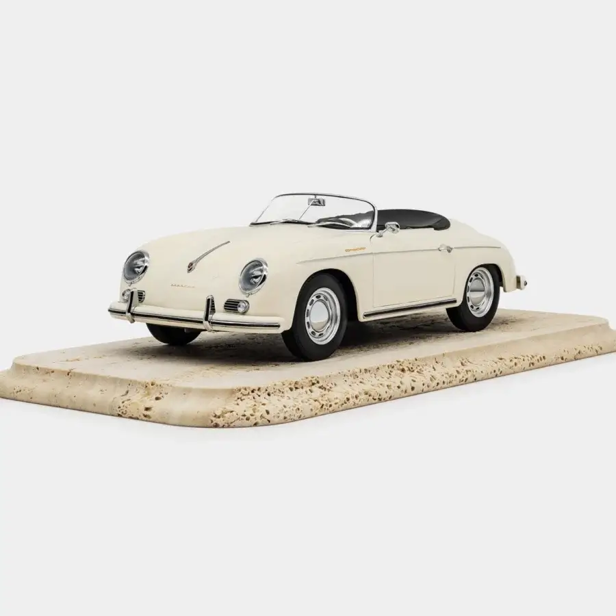 Exquisite Vèlle Milano Porsche 356 A Speedster scale model in metal with black interior and ivory finish on natural marble base