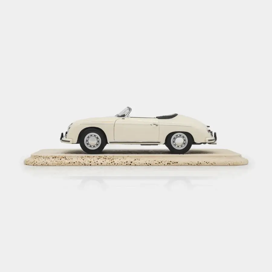 Exquisite Vèlle Milano Porsche 356 A Speedster model in high-gloss ivory metal with deep black interior and silver accents