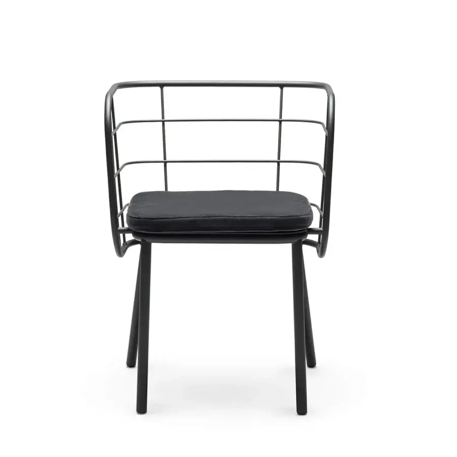 Architectural Chairs & More Jujube armchair in monochromatic black finish with plush textile seat and tubular metal backrest