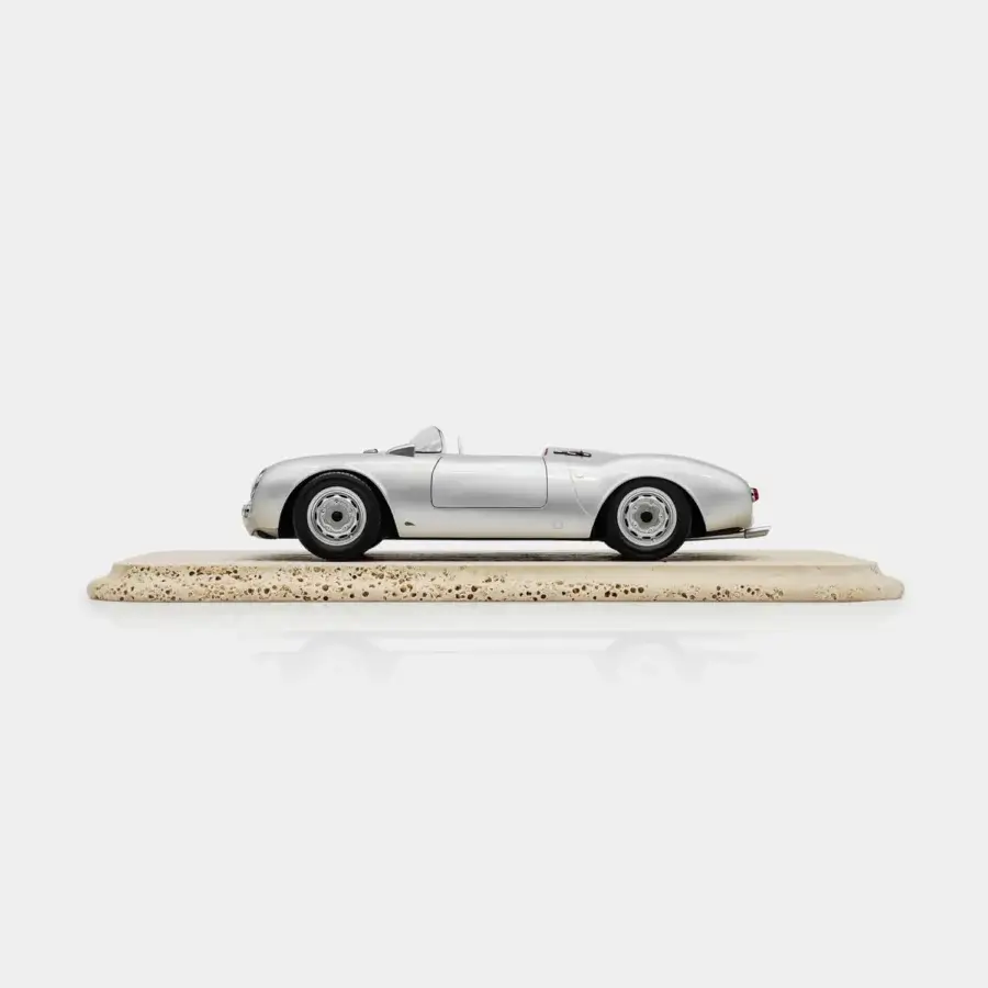 Refined Vèlle Milano Porsche 550A Spyder model with burgundy interior, natural marble base and glossy silver metal finish