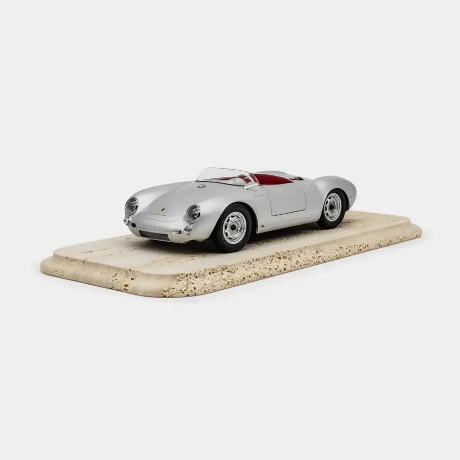 Sophisticated Vèlle Milano Porsche 550A Spyder metal model in polished silver and burgundy with natural marble base