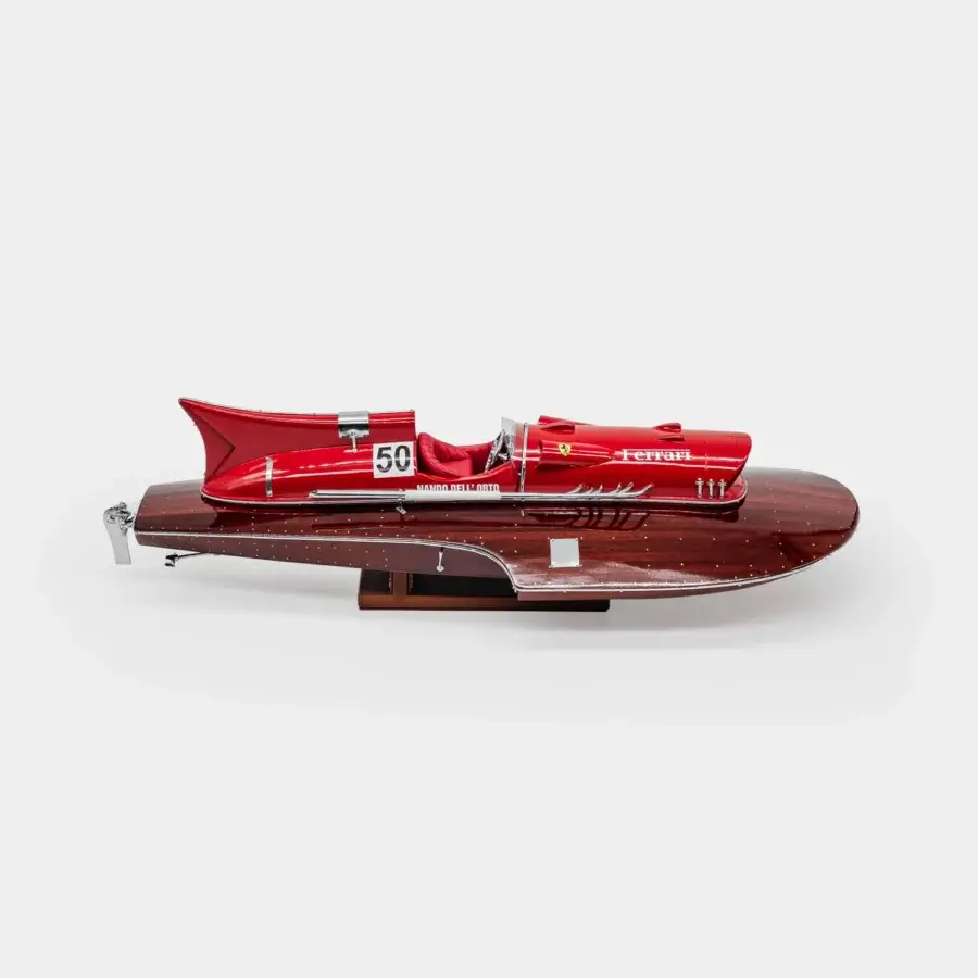 Exquisite Vèlle Milano Ferrari Arno XI hydroplane in vibrant red metal and polished mahogany on leather natural marble base