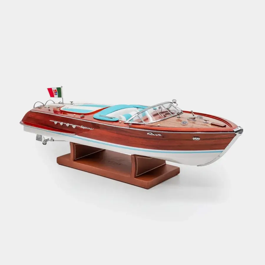 Lustrous Vèlle Milano Riva Acquarama reproduction with mirror-polished mahogany, turquoise interior and brown leather base