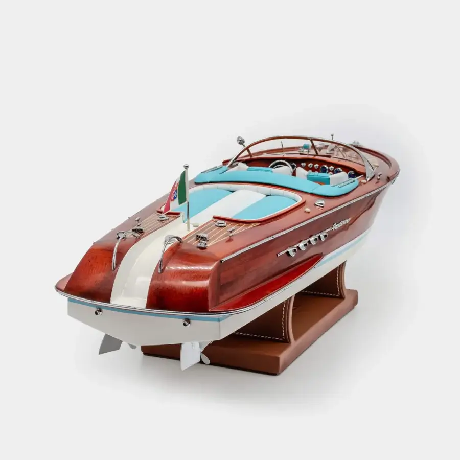 Sleek Vèlle Milano Riva Acquarama reproduction in mirror-polished mahogany, metal, white hull and turquoise-blue upholstery