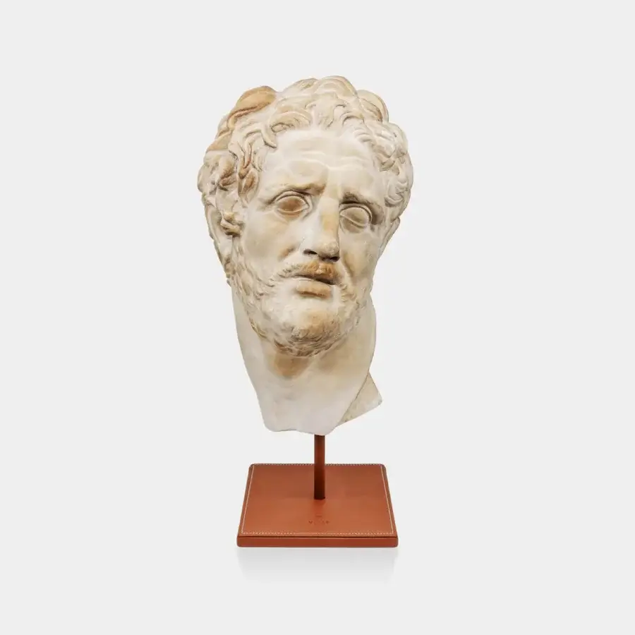 Refined Vèlle Milano Companion of Odysseus sculptural bust in aged cream plaster on a terracotta-hued leather steel base