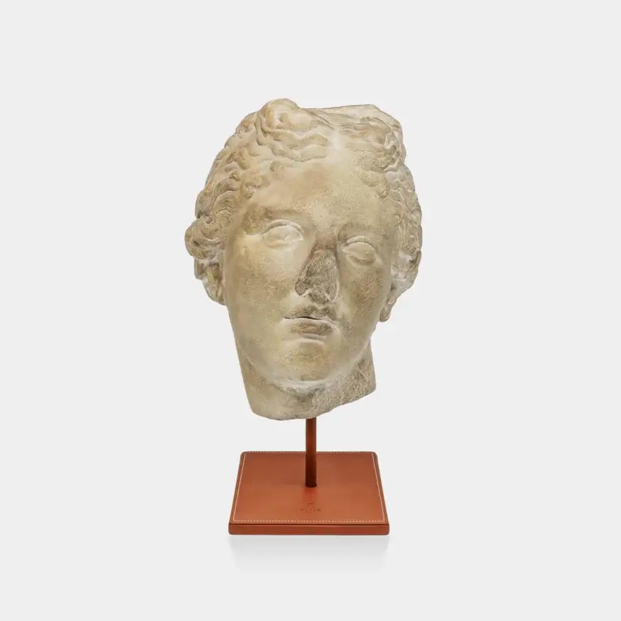 Sophisticated Vèlle Milano Companion of Odysseus sculptural bust in aged off-white plaster with terracotta leather steel base