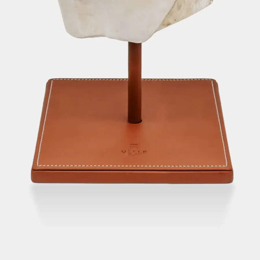 Distinguished Vèlle Milano Companion of Odysseus sculpture in off-white beige aged plaster with cognac brown leather base