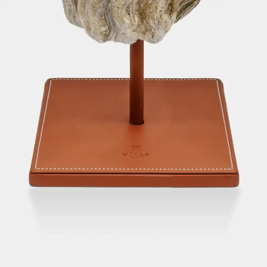 Sophisticated Vèlle Milano Plato sculpture in weathered cream and beige aged effect plaster with terracotta brown leather base