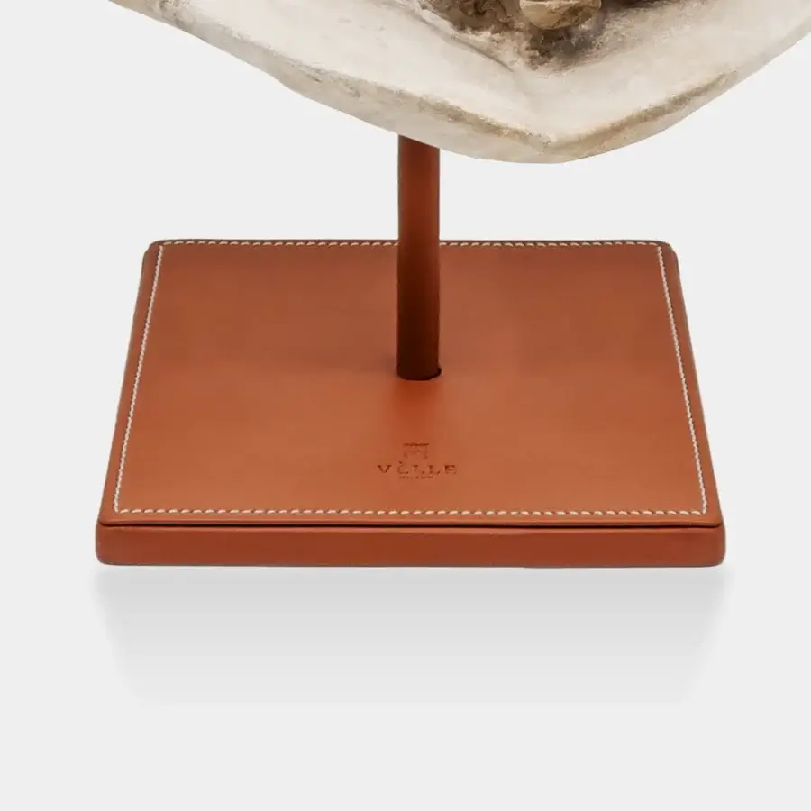 Exquisite Vèlle Milano Silenus Sculpture in off-white beige aged plaster with tan leather wrapped powder-coated steel base