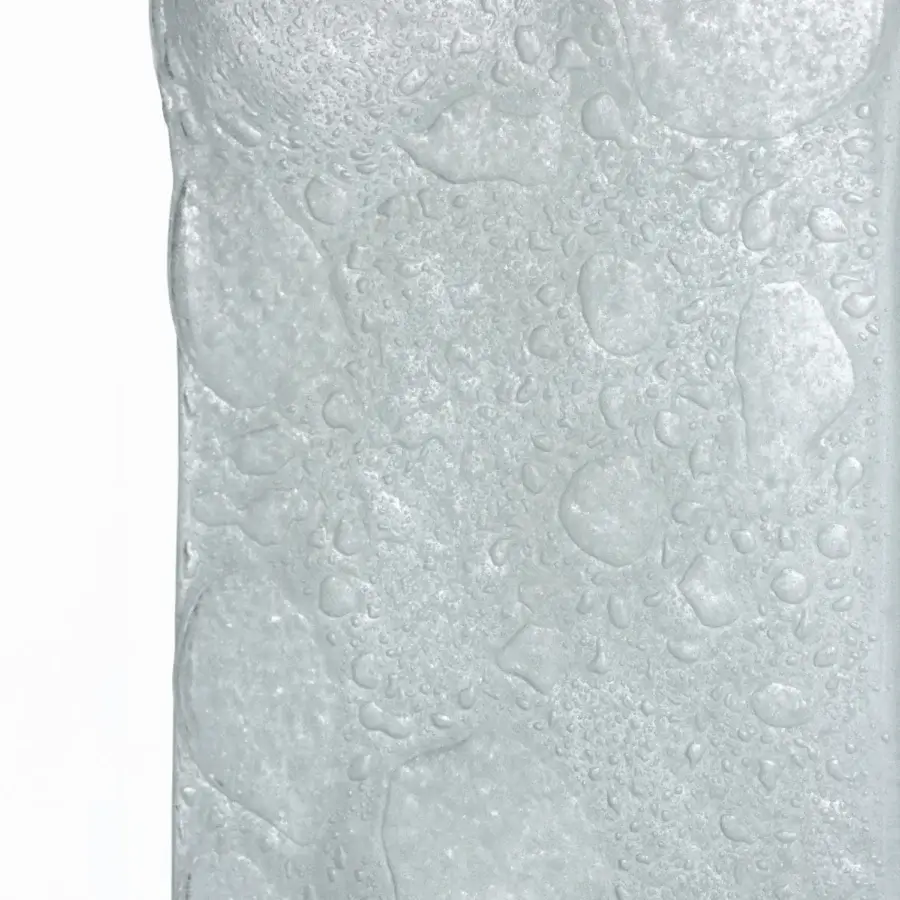 Refined Glas Italia Opalia table in pale blue and silvery-white fused glass with a textured organic bubble-like surface