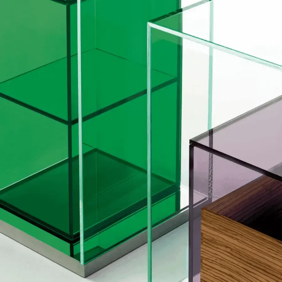 Exquisite Glas Italia BoxInBox display case with translucent green purple colored interior and mirror-polished stainless steel base