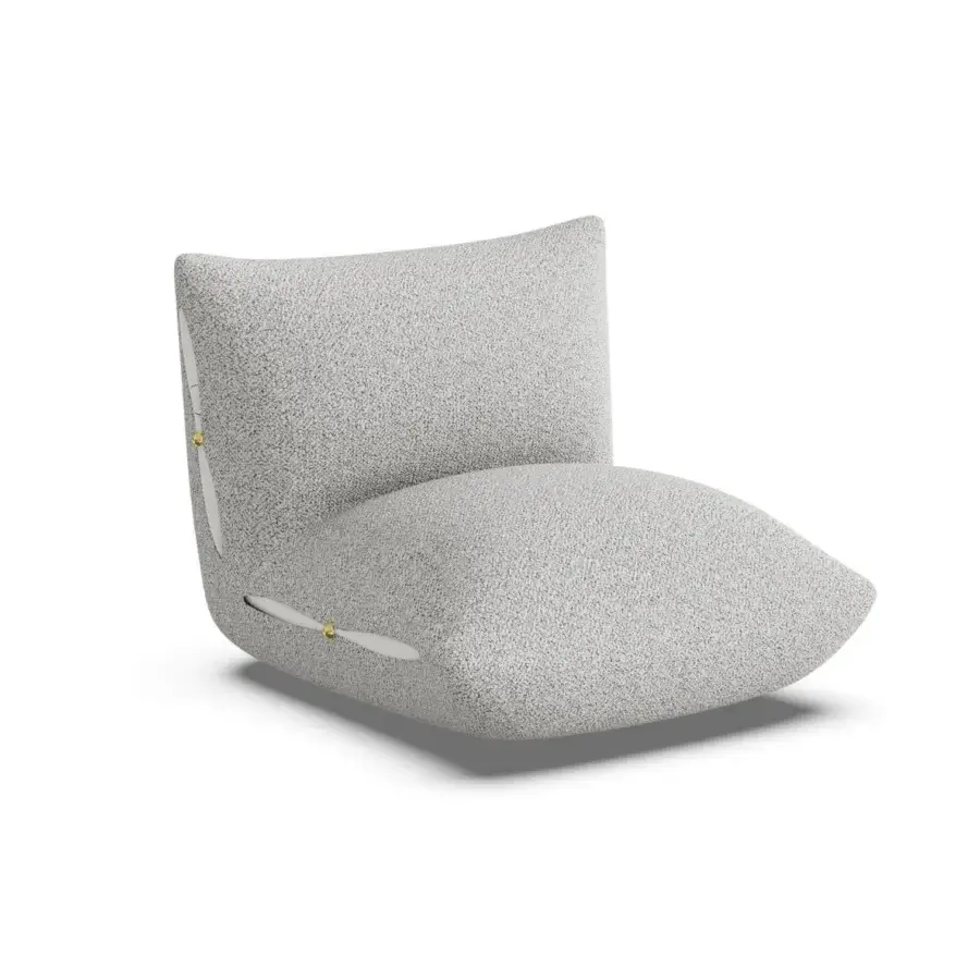 Sophisticated Furla Casa Cherry Blossom lounge chair in textured light grey fabric with smooth white and gold toned accents