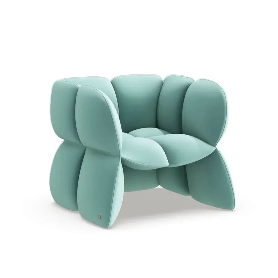 Architectural Furla Casa Fiore lounge chair in mint green fabric with metal frame and organic petal-like silhouette