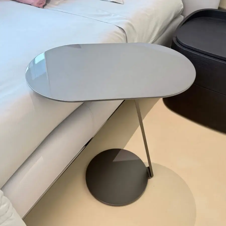 Architectural Furla Casa Magica side table with oval lacquered veneered wood top and grey epoxy resin coated metal base