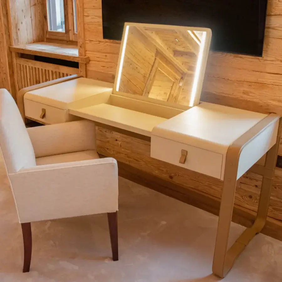 Refined Vèlle Milano Alice vanity desk in off-white leather with pulls, matte champagne metal frame and backlit mirror