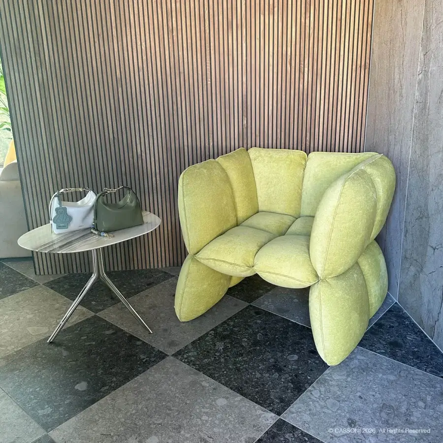 Architectural Furla Casa Fiore lounge chair in textured lime green textile with bulbous organic segments and metal frame