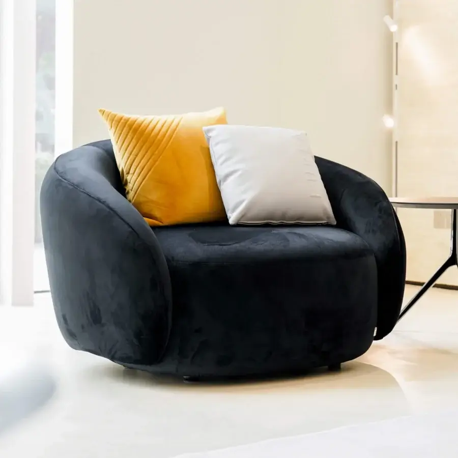 Exquisite Furla Casa Opportunity lounge chair in plush black fabric with organic silhouette and solid beech wood base