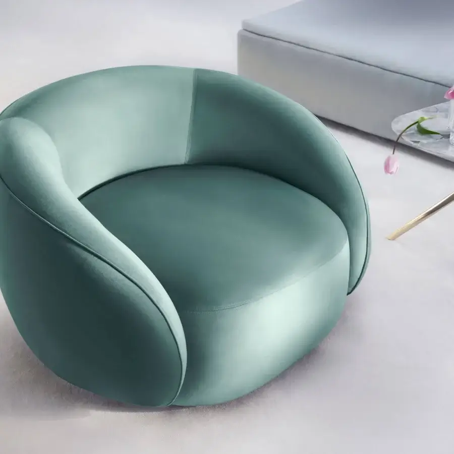 Sophisticated Furla Casa Opportunity lounge chair in muted teal fabric and black beech wood with soft plush finish