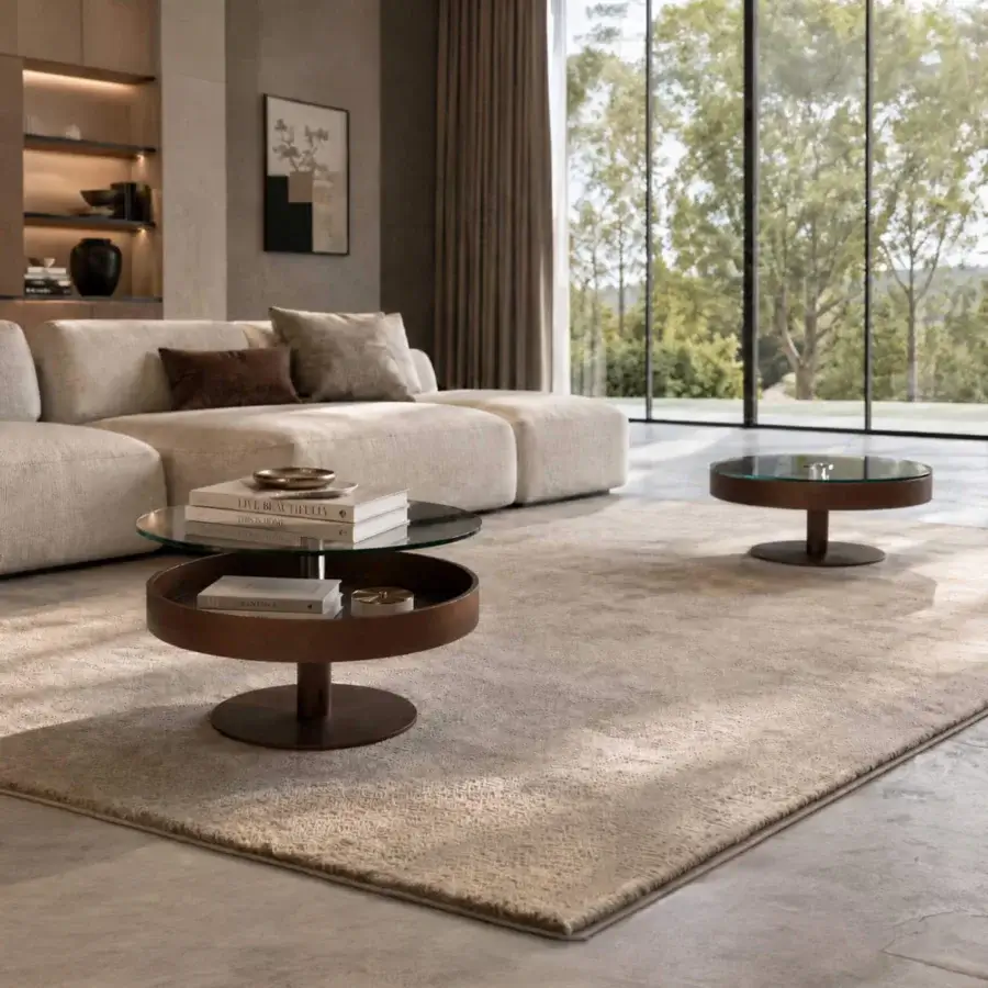 Premium Naos Levante round coffee table with transparent glass top and dark bronze painted smooth satin finish frame