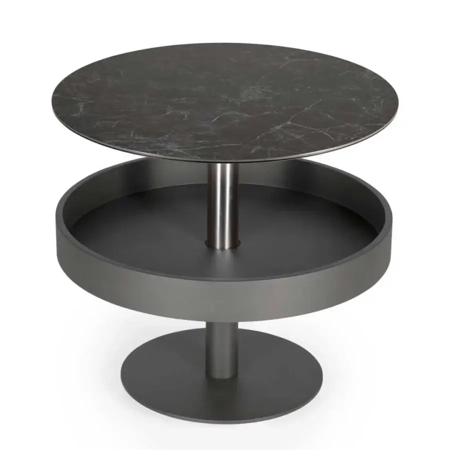 Sleek Naos Levante round coffee table with polished ceramic top, grey veining, matte dark painted frame and silver pillar