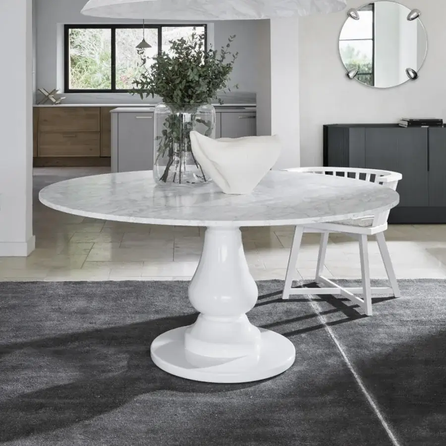 Sophisticated Gervasoni Gray 38 Round Table crafted in white Carrara marble and curved Millgres central base
