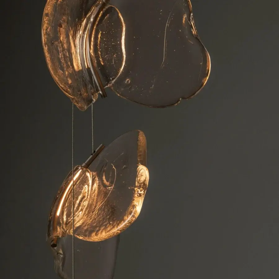 Exceptional Bocci 141 Cluster Suspension Lamp with amber golden translucent glass held by slender dark metal cables