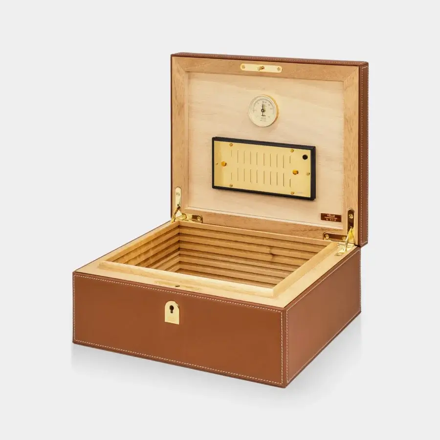 Distinguished Vèlle Milano Cigars Humidor in tan-brown padded leather with white contrast stitching and Spanish cedar lining