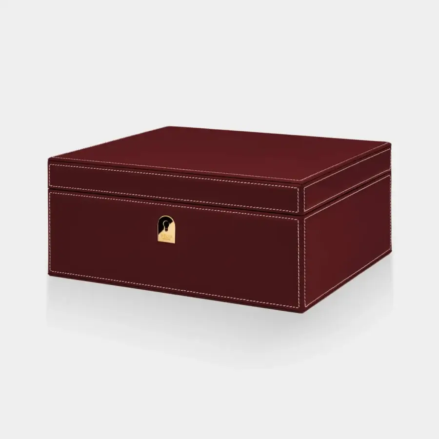 Impeccable Vèlle Milano Cigars Humidor in deep burgundy padded leather with white contrast stitching and gold-toned metal plaque