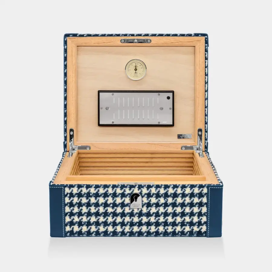 Premium Vèlle Milano Cigars humidor crafted from Spanish cedar in blue and white houndstooth Loro Piana fabric with leather trims
