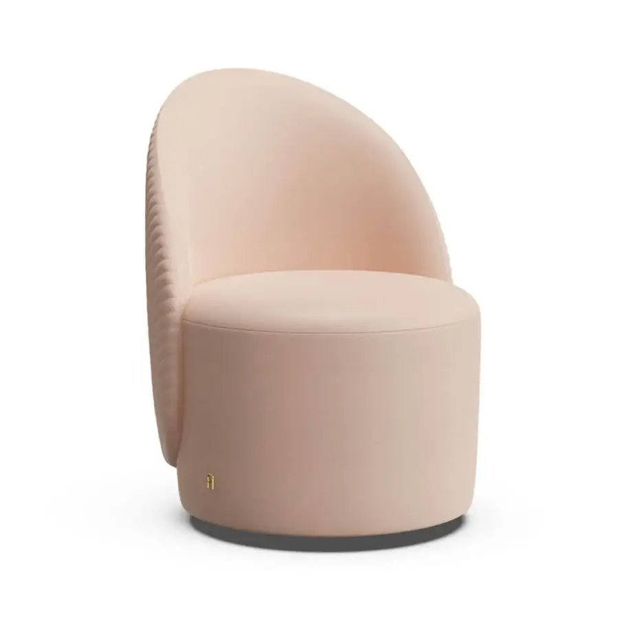 Distinguished Furla Casa Venus swivel lounge chair in pale pink fabric with V-shaped quilted backrest and matte black base