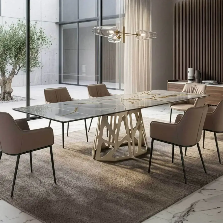 Exquisite Naos Graal extendable table with glossy grey ceramic top, gold-brown veining and matte cream sculptural metal base