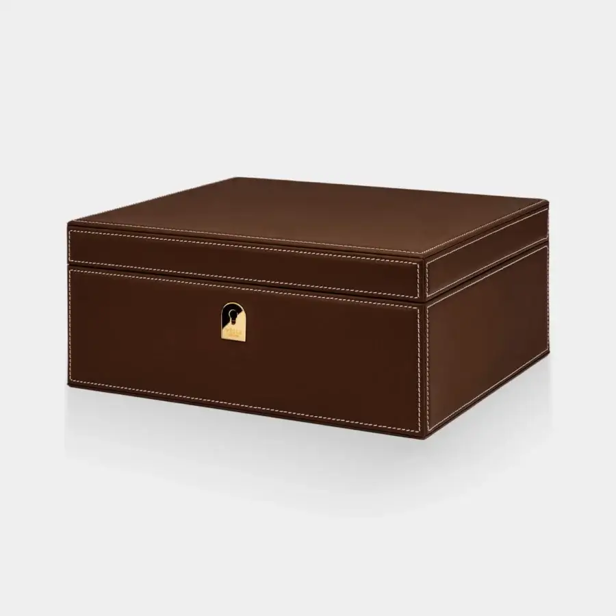 Handcrafted Vèlle Milano watch case in dark brown padded leather with white contrast stitching and gold-toned metal plate
