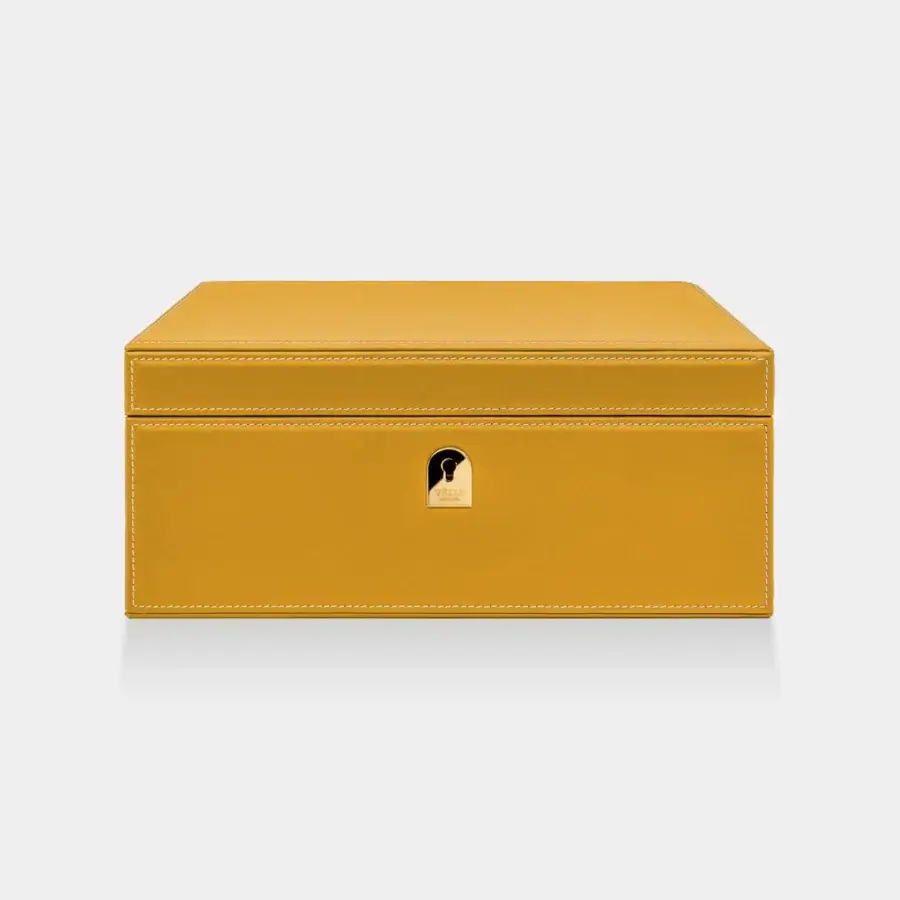 Sumptuous Vèlle Milano Watch Case in saffron yellow padded leather with contrast stitching and gold toned metal plate