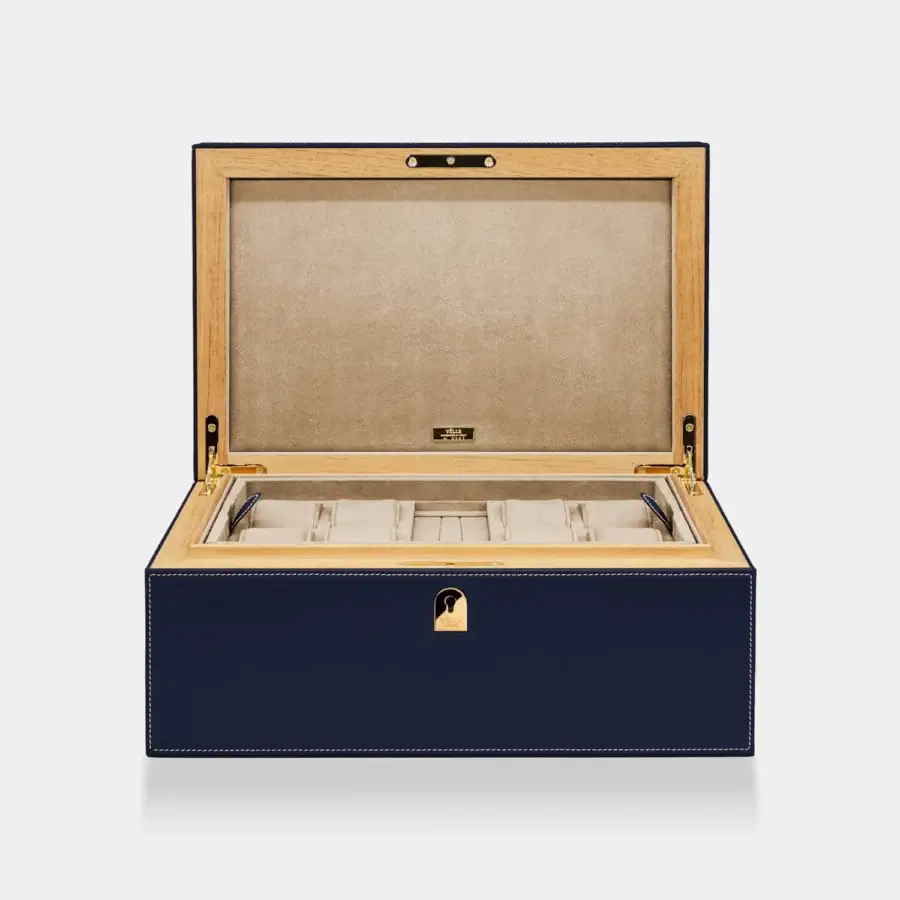 Exquisite Vèlle Milano Watch Case Grand in navy blue padded leather with white stitching and polished gold-toned hardware