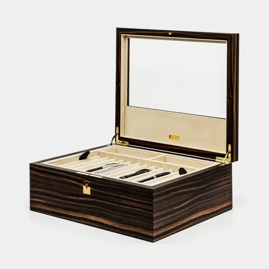 Distinguished Vèlle Milano Monaco pens box crafted from polished Macassar ebony with glass lid and gold tone metal hardware