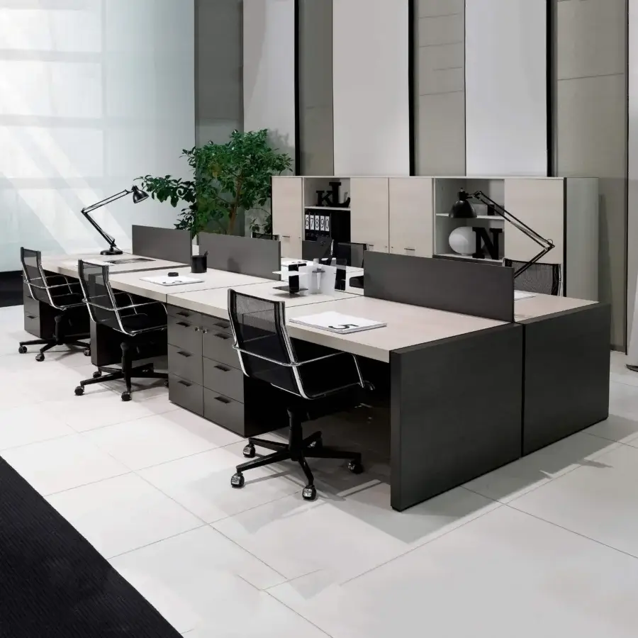 Distinguished 4 Mariani Blade desk with dark grey base supporting lighter wood, saddle leather detailing and three drawers
